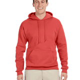 Man smiling in red pullover hoodie with front pouch pocket and beige pants on transparent background