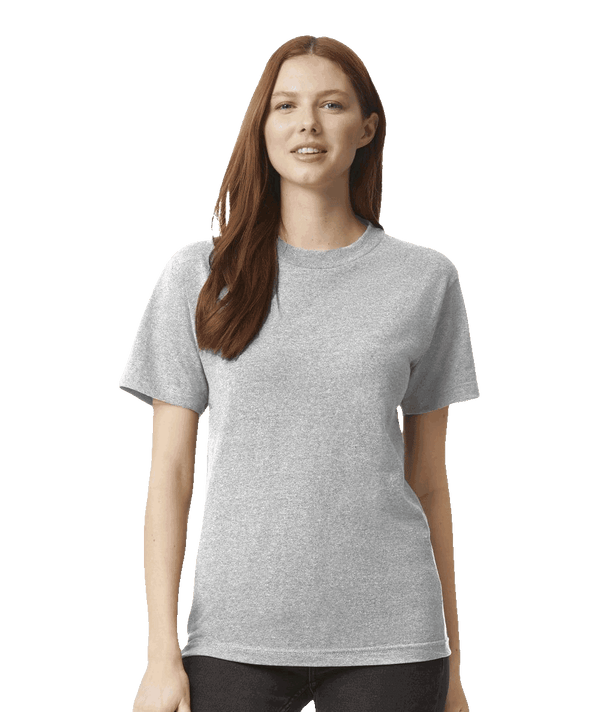Woman wearing a Heather Grey American Apparel Heavyweight Cotton Tee 1301, classic fit crewneck T-shirt with a sturdy feel, ideal for custom prints and casual wear