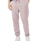 Light mauve jogger sweatpants with elastic waistband and drawstring, paired with white sneakers for a clean casual outfit