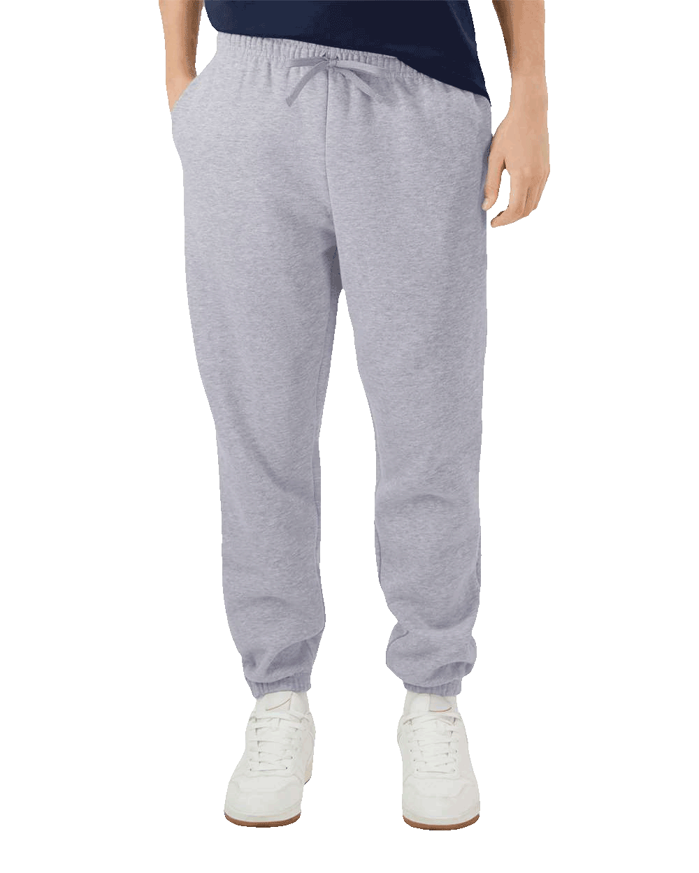 Front view of light grey sweatpants with drawstring waist and cuffed ankles, styled with white sneakers
