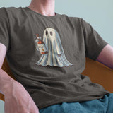 A male model leaning back on a chair, wearing a vintage Comfort Colors Tshirt in Pepper Gray color. The retro design features a cute bedsheet ghost holding a bottle of liquor that say Boos.