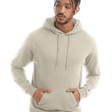 Man in light beige Champion hoodie with front pocket and drawstrings, hands in pocket, isolated on transparent background