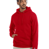 Man wearing a bold red Champion hoodie with front pocket and drawstrings, hand in pocket, on transparent background