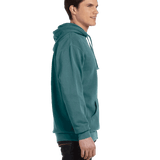 Profile view of a man in a Blue Spruce Comfort Colors Heavyweight Hoodie, showcasing the side details with a relaxed fit.