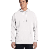 Man wearing a Comfort Colors Heavyweight Hoodie in White, featuring a front pocket and relaxed fit. Model is smiling and standing with hands relaxed