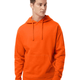 Male model wearing an orange hoodie with drawstrings and kangaroo pocket, paired with blue jeans