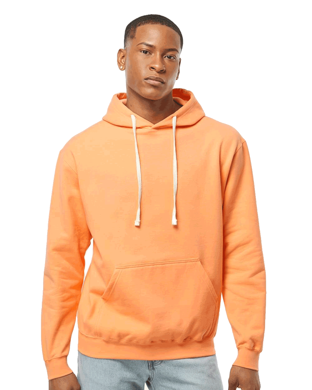Tultex Blank peach pullover hoodie on male model, kangaroo pocket and white drawstrings, ideal for custom apparel printing