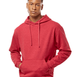 Tultex Heather red pullover hoodie on male model, kangaroo pocket and matching drawstrings, blank canvas for custom screen printing