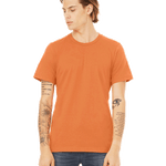 Man in a "Burnt Orange" Bella + Canvas Unisex Jersey T-Shirt, standing casually with a neutral expression, looking to the side.