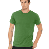 Man wearing a Bella + Canvas Unisex Jersey T-Shirt in "Leaf" color, standing with a neutral expression and hands by his sides.