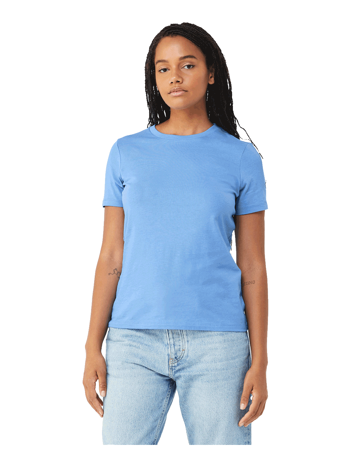 Front view of a woman modeling a Bella + Canvas Ladies' Relaxed Jersey Short-Sleeve T-Shirt in Carolina Blue color, paired with light blue jeans.