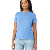 Front view of a woman modeling a Bella + Canvas Ladies' Relaxed Jersey Short-Sleeve T-Shirt in Carolina Blue color, paired with light blue jeans.