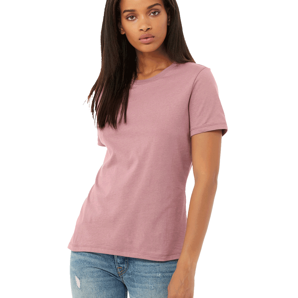 Front view of a woman modeling a Bella + Canvas Ladies' Relaxed Jersey Short-Sleeve T-Shirt in Orchid color, paired with light blue jeans.