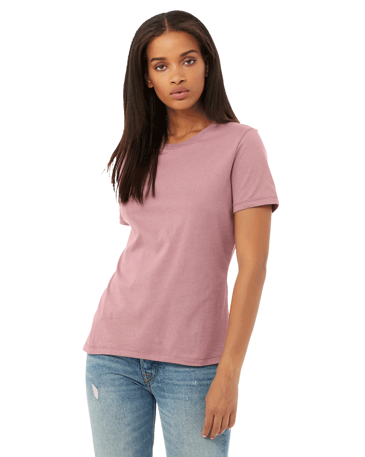 Front view of a woman modeling a Bella + Canvas Ladies' Relaxed Jersey Short-Sleeve T-Shirt in Orchid color, paired with light blue jeans.