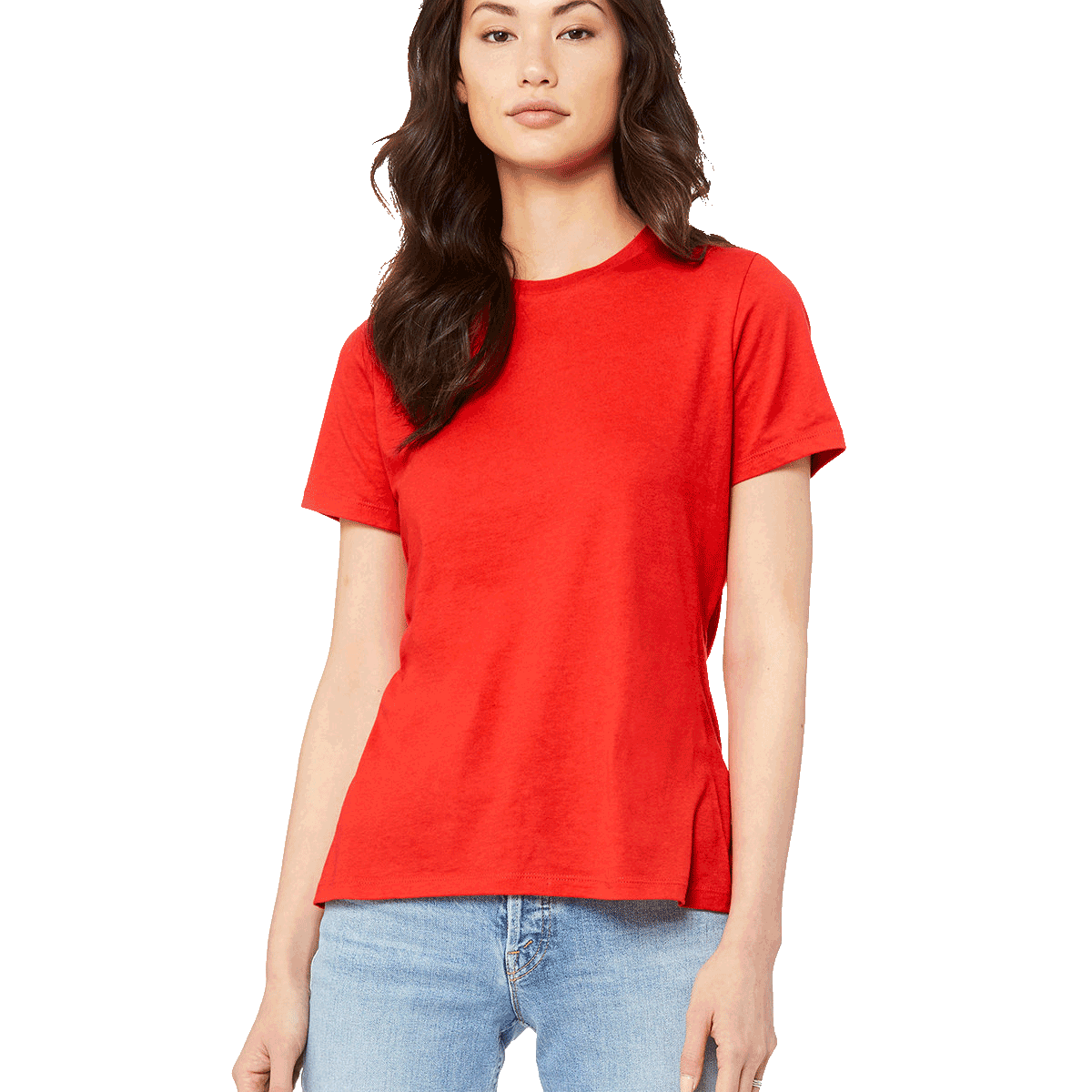 Woman wearing a Bella + Canvas Ladies' Relaxed Jersey Short-Sleeve T-Shirt in Red color, standing with a neutral expression and light blue jeans.