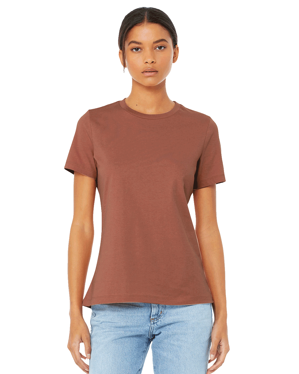 Model showcasing a Bella + Canvas Ladies' Relaxed Jersey Short-Sleeve T-Shirt in the Terracotta color, paired with light-wash jeans and a confident pose.