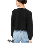 Rear view of a woman wearing a Bella + Canvas Ladies' Raglan Pullover Fleece in Black.