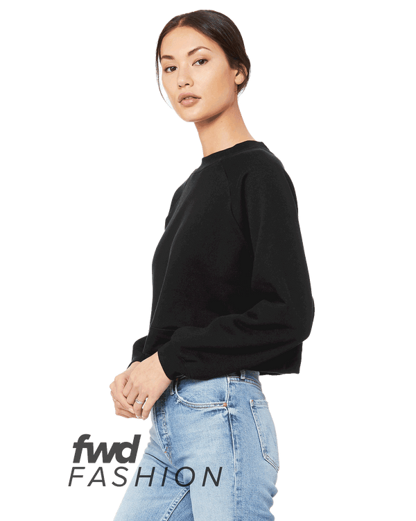 Woman wearing a Bella + Canvas Ladies' Raglan Pullover Fleece in Black.