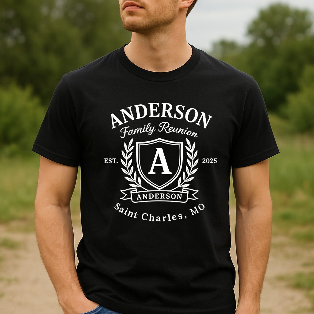 Man wearing black Anderson Family Reunion tee featuring white shield crest logo, Est. 2025 and Saint Charles, MO, custom reunion shirt design