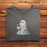 A folded vintage Comfort Colors Tshirt in Pepper Gray color, laying on a wooden table. The retro design features a cute bedsheet ghost holding a bottle of liquor that say Boos.