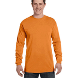 Man wearing a Comfort Colors Heavyweight Long Sleeve T-shirt in Burnt Orange.