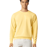 Man wearing a Comfort Colors Unisex Lightweight Cotton Crewneck Sweatshirt in Butter.