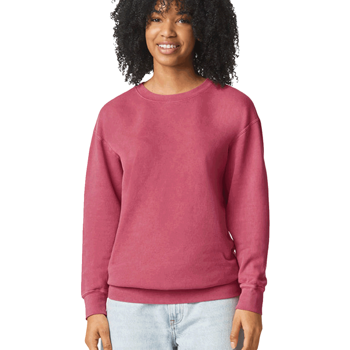 Woman wearing a Comfort Colors Unisex Lightweight Cotton Crewneck Sweatshirt in Crimson.