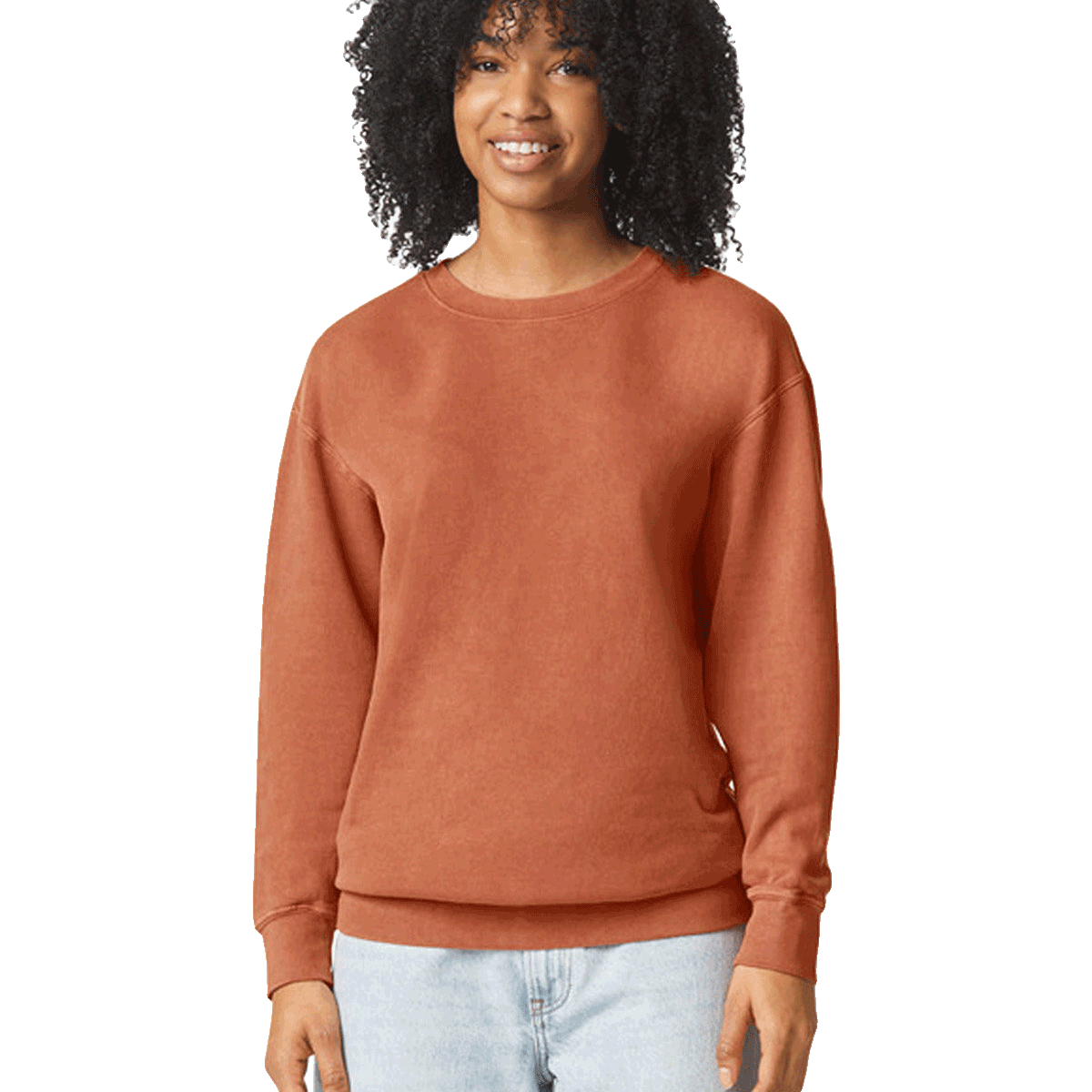 Woman wearing a Comfort Colors Unisex Lightweight Cotton Crewneck Sweatshirt in Yam.