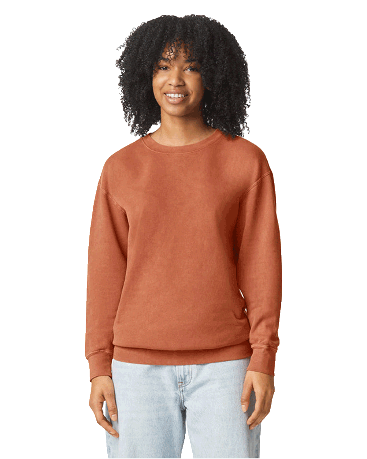 Woman wearing a Comfort Colors Unisex Lightweight Cotton Crewneck Sweatshirt in Yam.