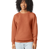 Woman wearing a Comfort Colors Unisex Lightweight Cotton Crewneck Sweatshirt in Yam.