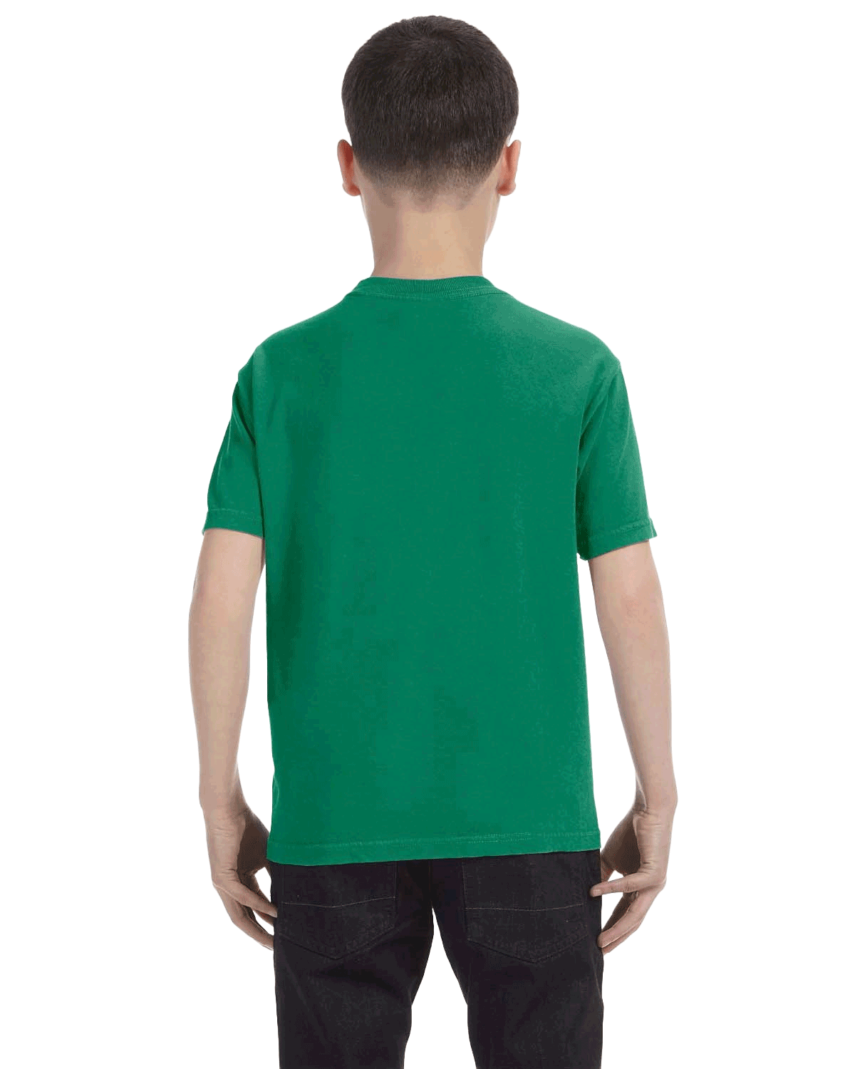 Back view of a boy wearing a Comfort Colors Youth Midweight T-Shirt in "Grass" color, standing with hands by his sides.