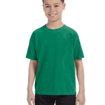 Comfort Colors Youth Midweight T-Shirt in "Grass" color worn by a smiling boy standing with hands relaxed.