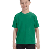 Comfort Colors Youth Midweight T-Shirt in "Grass" color worn by a smiling boy standing with hands relaxed.