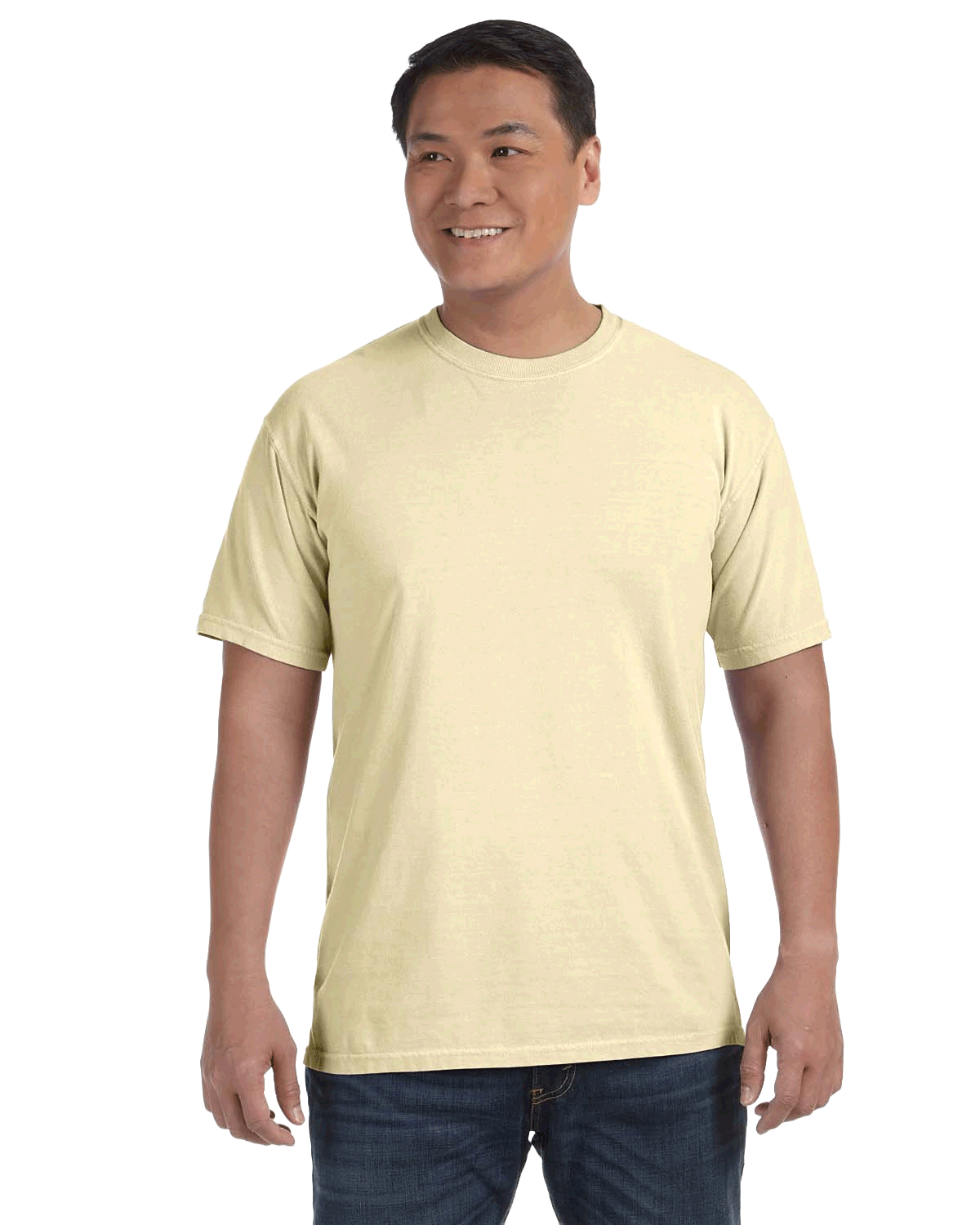 Man wearing a Comfort Colors Heavyweight T-Shirt in "Banana" color, smiling while standing with hands by his sides.