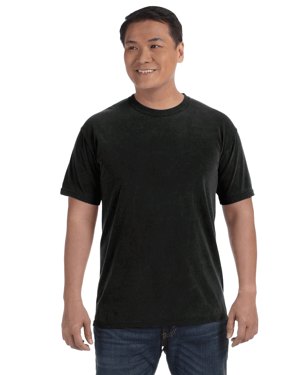 Man wearing a Comfort Colors Heavyweight T-Shirt in "Black" color, smiling while standing with hands by his sides.