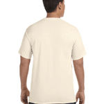 Back view of a man wearing a Comfort Colors Heavyweight T-Shirt in "Ivory" color, standing with hands by his sides.