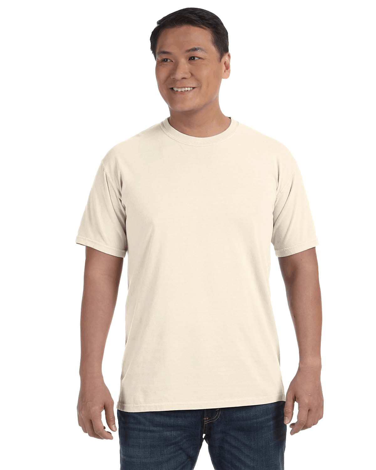 Man wearing a Comfort Colors Heavyweight T-Shirt in "Ivory" color, smiling while standing with hands by his sides.