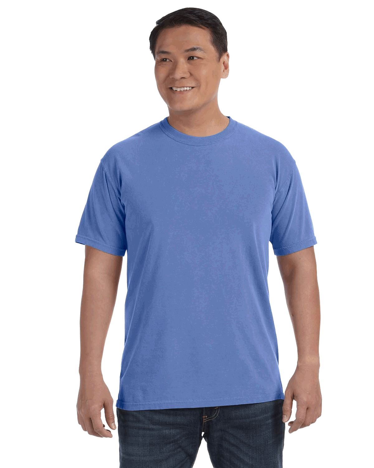 Man wearing a Comfort Colors Heavyweight T-Shirt in "Mystic Blue" color, smiling while standing with hands by his sides.