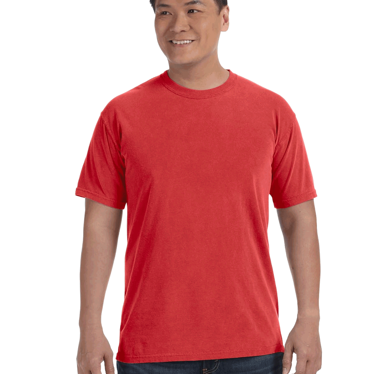 Man wearing a Comfort Colors Heavyweight T-Shirt in "Red" color, smiling with hands relaxed by his sides.