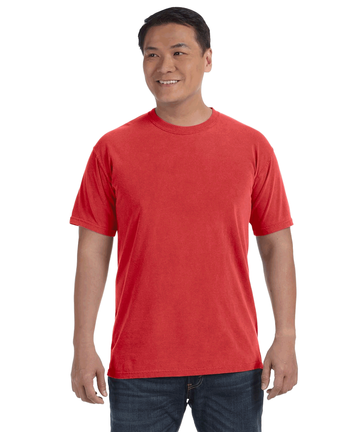 Man wearing a Comfort Colors Heavyweight T-Shirt in "Red" color, smiling with hands relaxed by his sides.