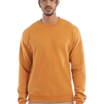 Man wearing a Champion Adult Powerblend Crewneck Sweatshirt in Gold Glint.