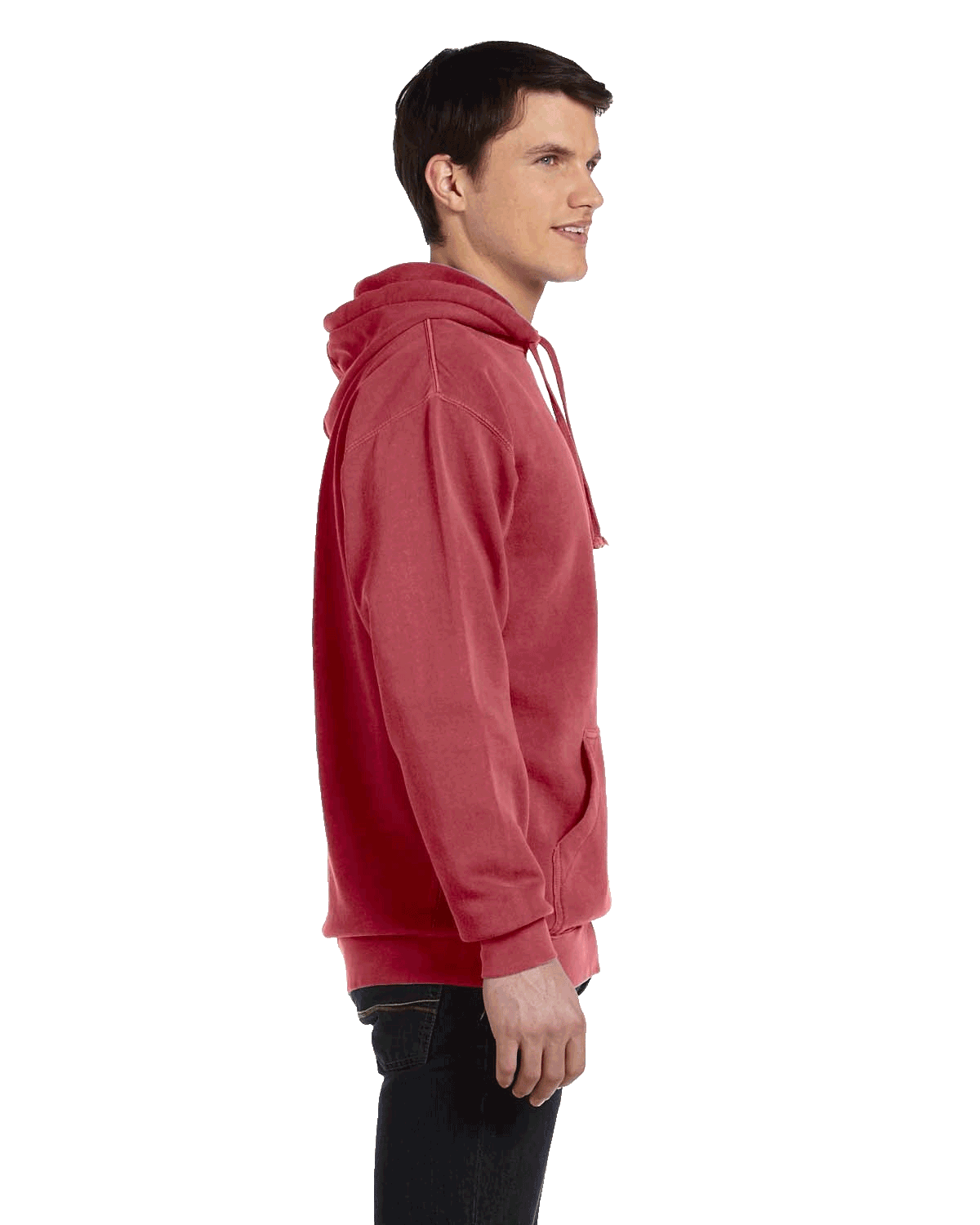 Profile view of a man in a Crimson Comfort Colors Heavyweight Hoodie, showcasing the side details with a relaxed fit