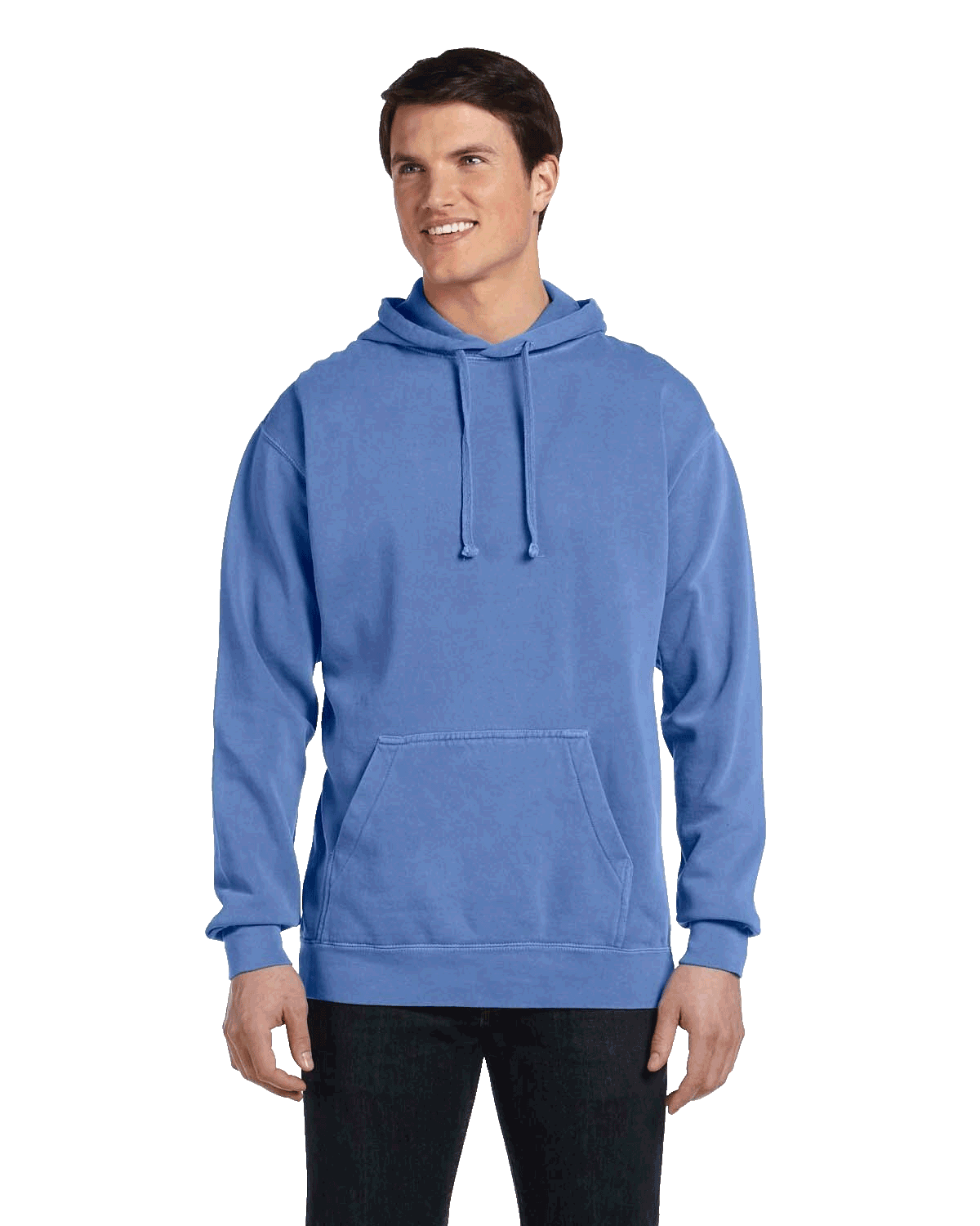 Man wearing a Comfort Colors Heavyweight Hoodie in Flo Blue, featuring a front pocket and relaxed fit. Model is smiling and standing with hands relaxed