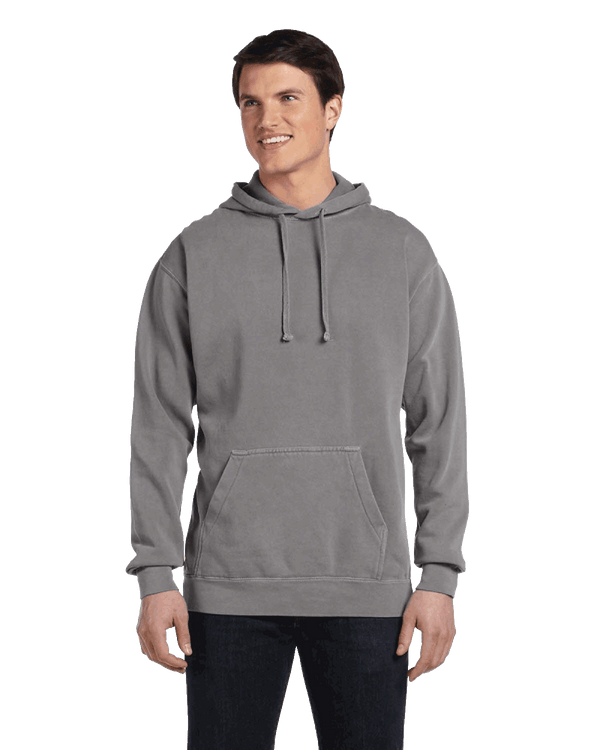 Man wearing a Comfort Colors Heavyweight Hoodie in Grey with a front pocket. Model is smiling with a relaxed stance.