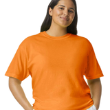 Comfort Colors 1717 heavyweight T-shirt in Bright Orange, shown on a model from the front.
