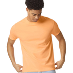 Comfort Colors 1717 heavyweight T-shirt in Neon Cantaloupe, shown on a model from the front.