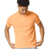 Comfort Colors 1717 heavyweight T-shirt in Neon Cantaloupe, shown on a model from the front.