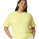 Comfort Colors 1717 heavyweight T-shirt in Neon Lemon, shown on a model from the front.