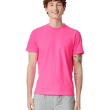 Comfort Colors 1717 heavyweight T-shirt in Neon Pink, shown on a model from the front.