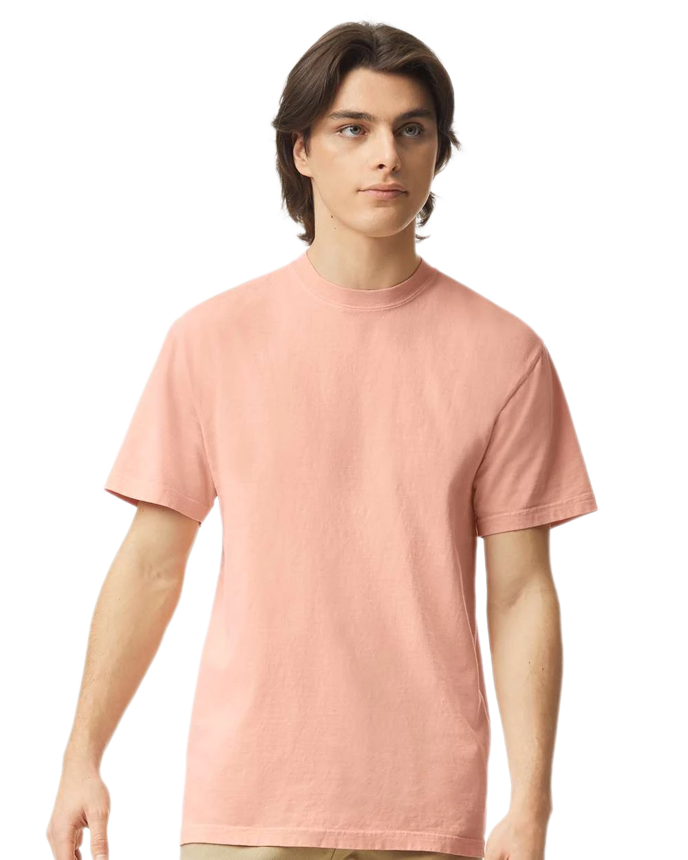 Comfort Colors 1717 heavyweight T-shirt in Peachy, shown on a model from the front.